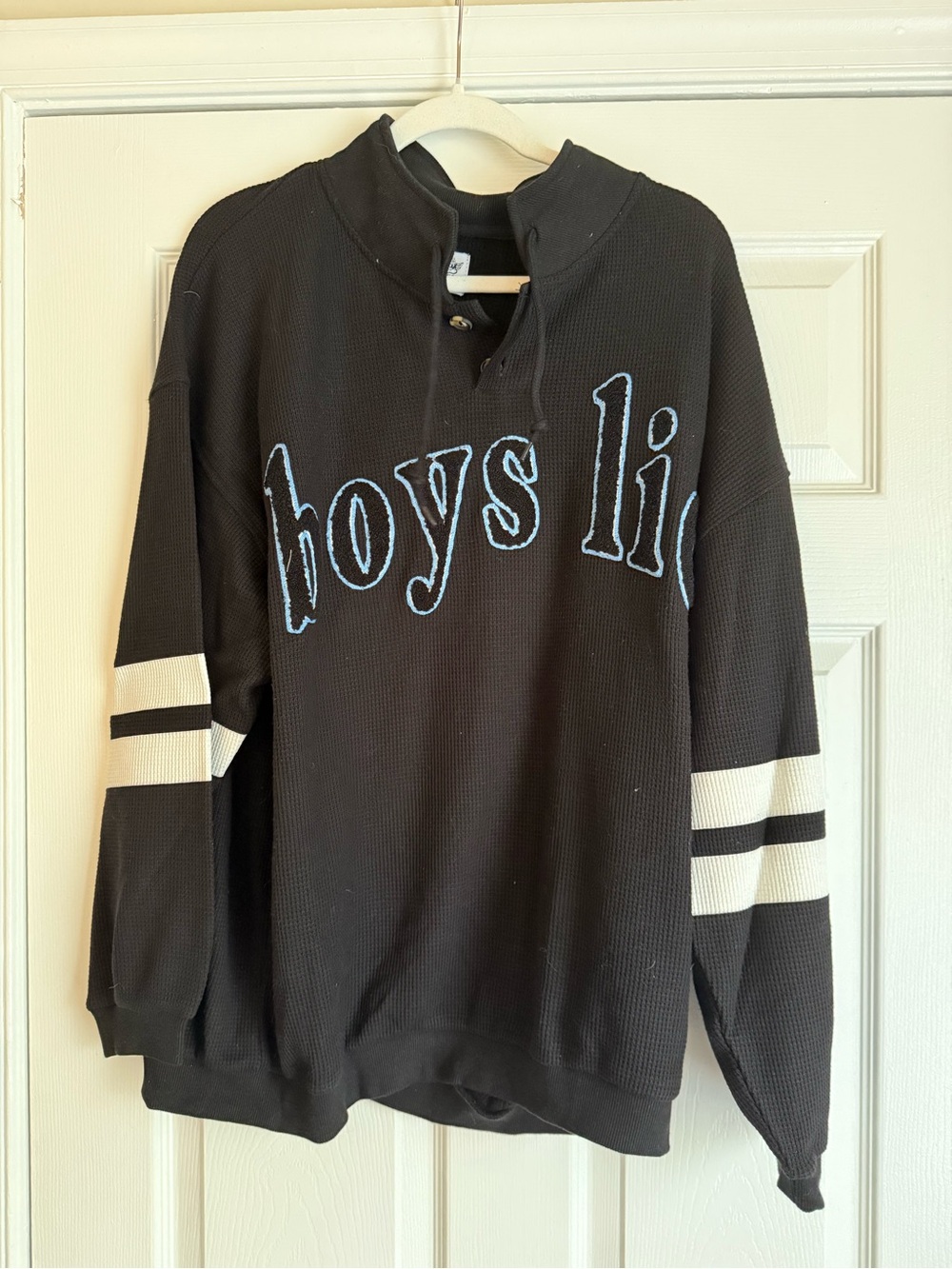 Boys Lie Black Crewneck Sweater with White Sleeve Stripes. Play with fire.